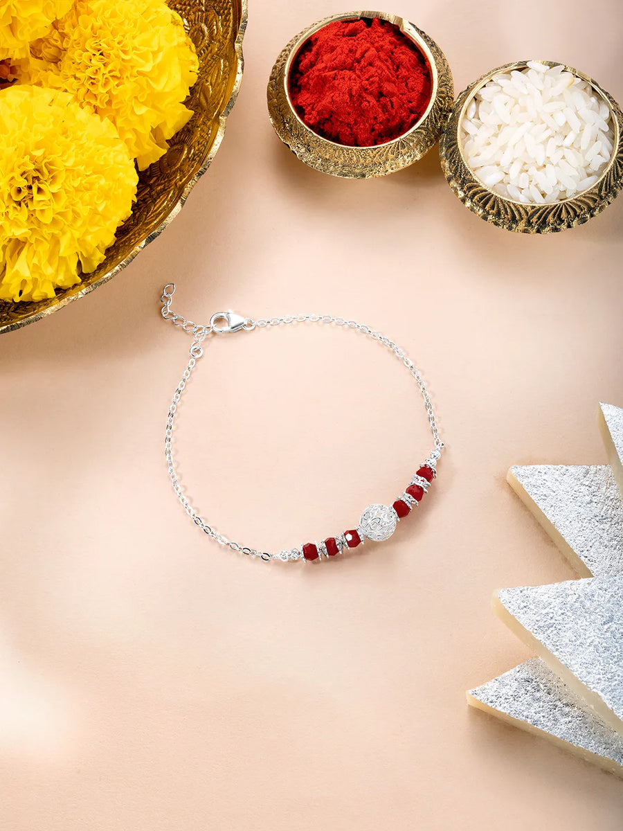 Close-up of Sterling Rakhi Bracelet with Beads featuring red - silver thread, beads work, and rhodium plating – ideal for Raksha Bandhan | Peora
