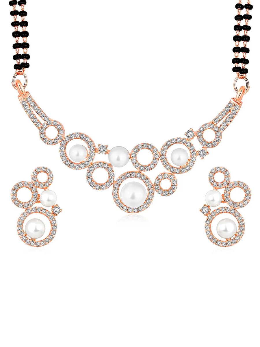 Beautiful Shimmering CZ Mangalsutra Set. A set of black beaded Mangalsutra with rose gold-colour and geometric patterns, with pearls, CZ stones.