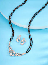 Beautiful Shimmering CZ Mangalsutra Set. A set of black beaded Mangalsutra with rose gold-colour and geometric patterns, with pearls, CZ stones.