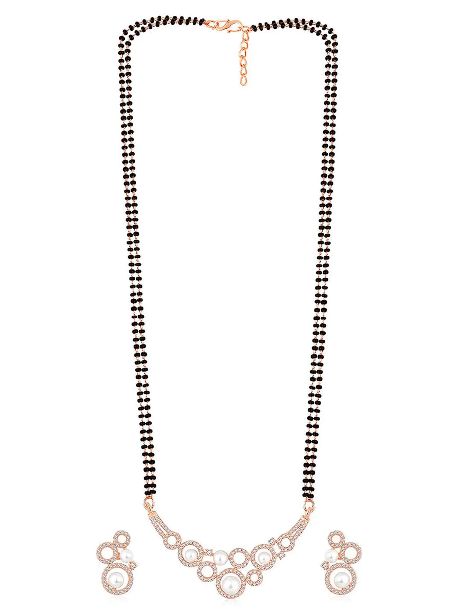 Beautiful Shimmering CZ Mangalsutra Set. A set of black beaded Mangalsutra with rose gold-colour and geometric patterns, with pearls, CZ stones.