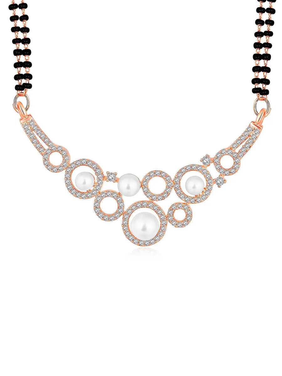 Beautiful Shimmering CZ Mangalsutra Set. A set of black beaded Mangalsutra with rose gold-colour and geometric patterns, with pearls, CZ stones.
