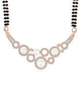 Beautiful Shimmering CZ Mangalsutra Set. A set of black beaded Mangalsutra with rose gold-colour and geometric patterns, with pearls, CZ stones.