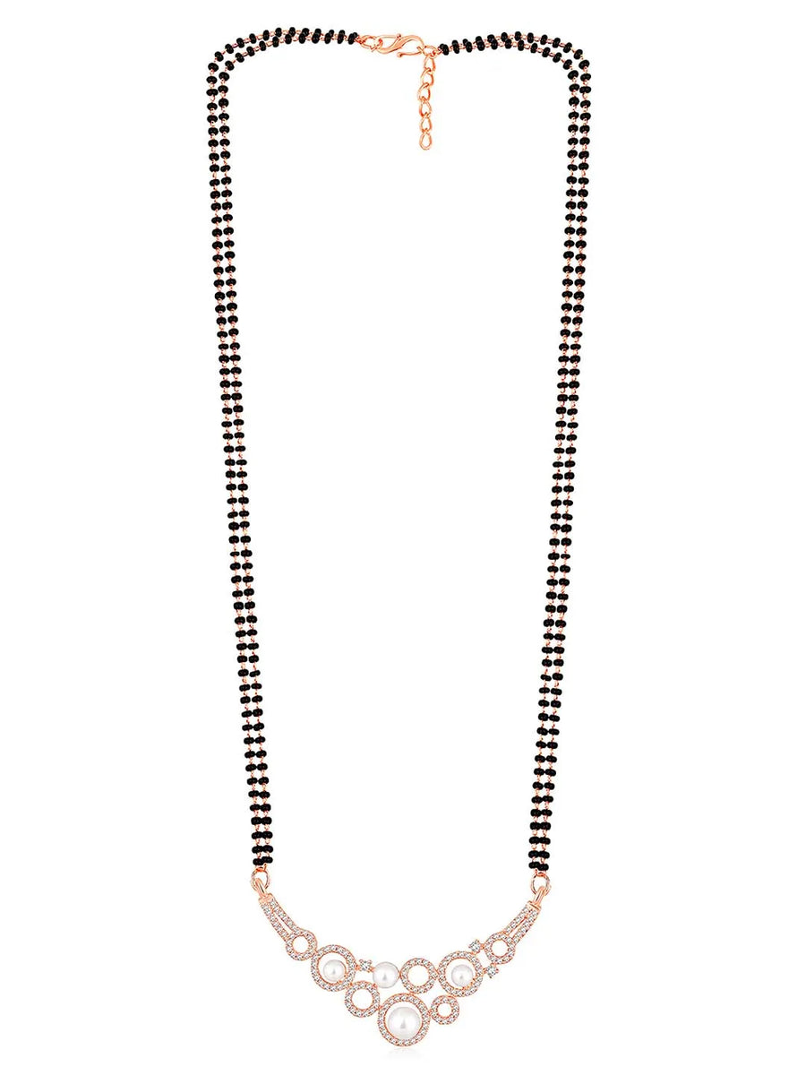 Beautiful Shimmering CZ Mangalsutra Set. A set of black beaded Mangalsutra with rose gold-colour and geometric patterns, with pearls, CZ stones.