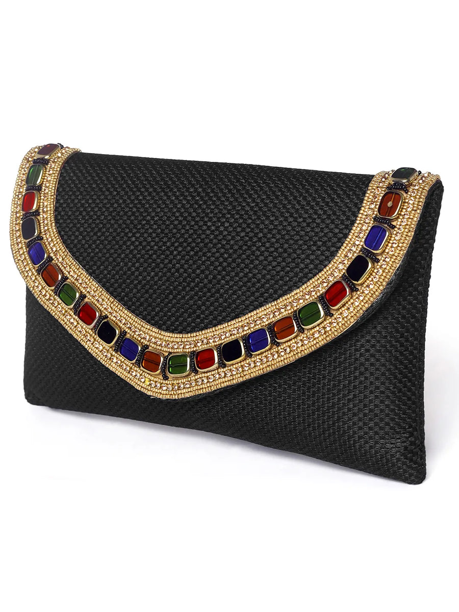 Black clutch bag named Woven Party Clutch with Stone Embellish, featuring faux emerald detailing and soft fabric texture | Peora
