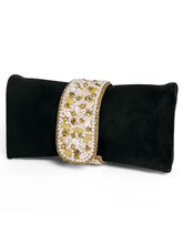 Black clutch bag named Clutch Bags Crafted for Elegance, featuring pearl detailing and soft fabric texture | Peora
