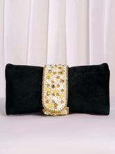 Black clutch bag named Clutch Bags Crafted for Elegance, featuring pearl detailing and soft fabric texture | Peora
