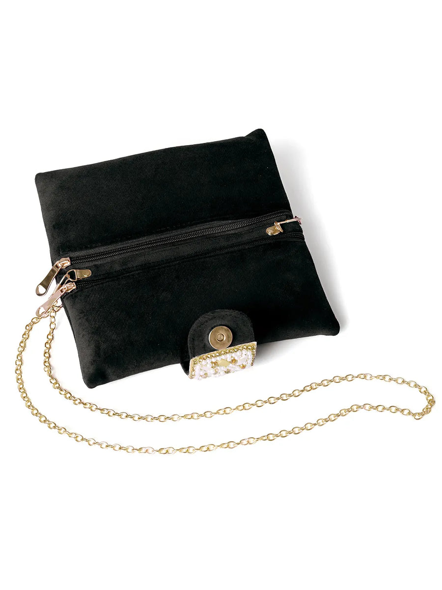 Black clutch bag named Clutch Bags Crafted for Elegance, featuring pearl detailing and soft fabric texture | Peora

