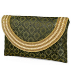 Blue clutch bag named Twilight Gleam Foldover Clutch, featuring pearl detailing and soft fabric texture | Peora
