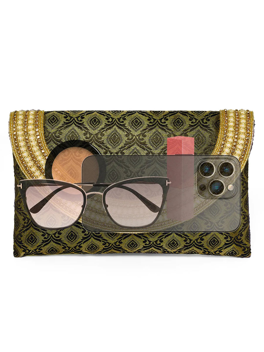 Blue clutch bag named Twilight Gleam Foldover Clutch, featuring pearl detailing and soft fabric texture | Peora
