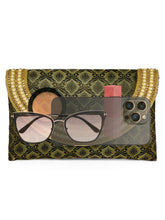 Blue clutch bag named Twilight Gleam Foldover Clutch, featuring pearl detailing and soft fabric texture | Peora
