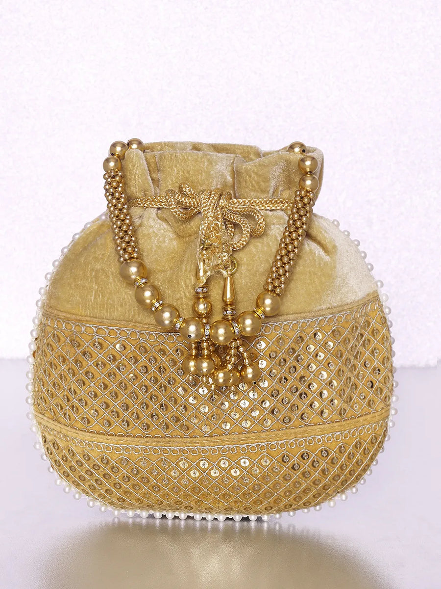 Brown potli bag named Pearl Trim Zari Bead Potli Bag, featuring artificial beads detailing and soft fabric texture | Peora
