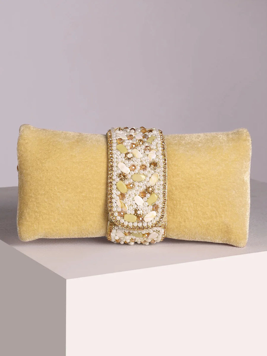 Brown clutch bag named Clutch Bags Crafted for Elegance, featuring pearl detailing and soft fabric texture | Peora
