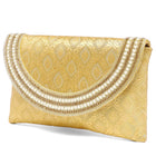 Gold clutch bag named Twilight Gleam Foldover Clutch, featuring pearl detailing and soft fabric texture | Peora
