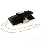 Black clutch bag named Clutch Bags Crafted for Elegance, featuring pearl detailing and soft fabric texture | Peora
