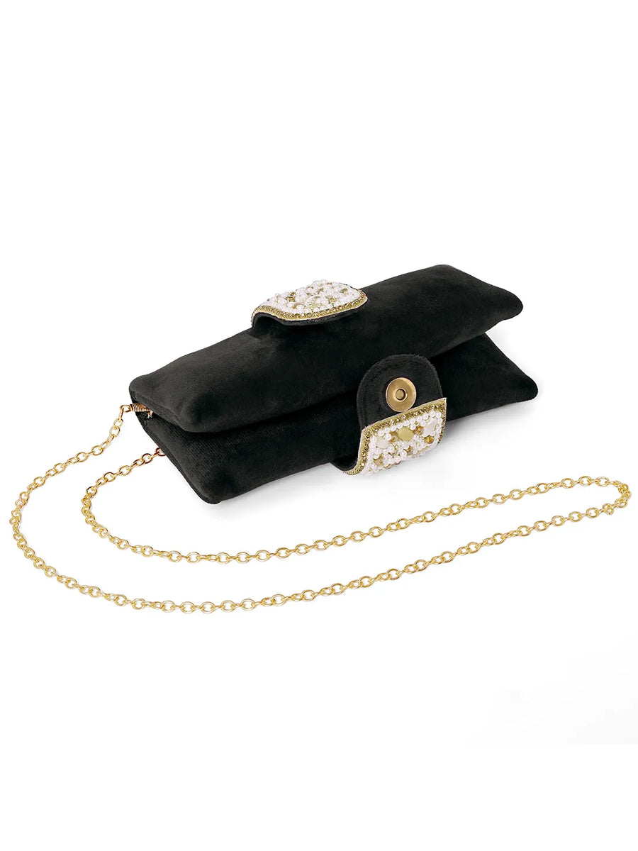 Black clutch bag named Clutch Bags Crafted for Elegance, featuring pearl detailing and soft fabric texture | Peora
