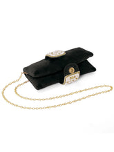 Black clutch bag named Clutch Bags Crafted for Elegance, featuring pearl detailing and soft fabric texture | Peora
