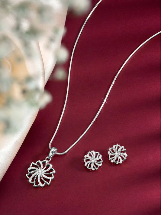 Petite Bloom CZ Floral Pendant Set by Peora. Silver-plating floral pendant necklace and matching earrings with CZ Stones.