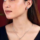 Petite Bloom CZ Floral Pendant Set by Peora. Silver-plating floral pendant necklace and matching earrings with CZ Stones.