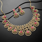 Radiant Ruby CZ and Necklace Set by Peora. Gold-plated necklace set with CZ & ruby stones with intricate designs. Best for weddings & bridal looks.