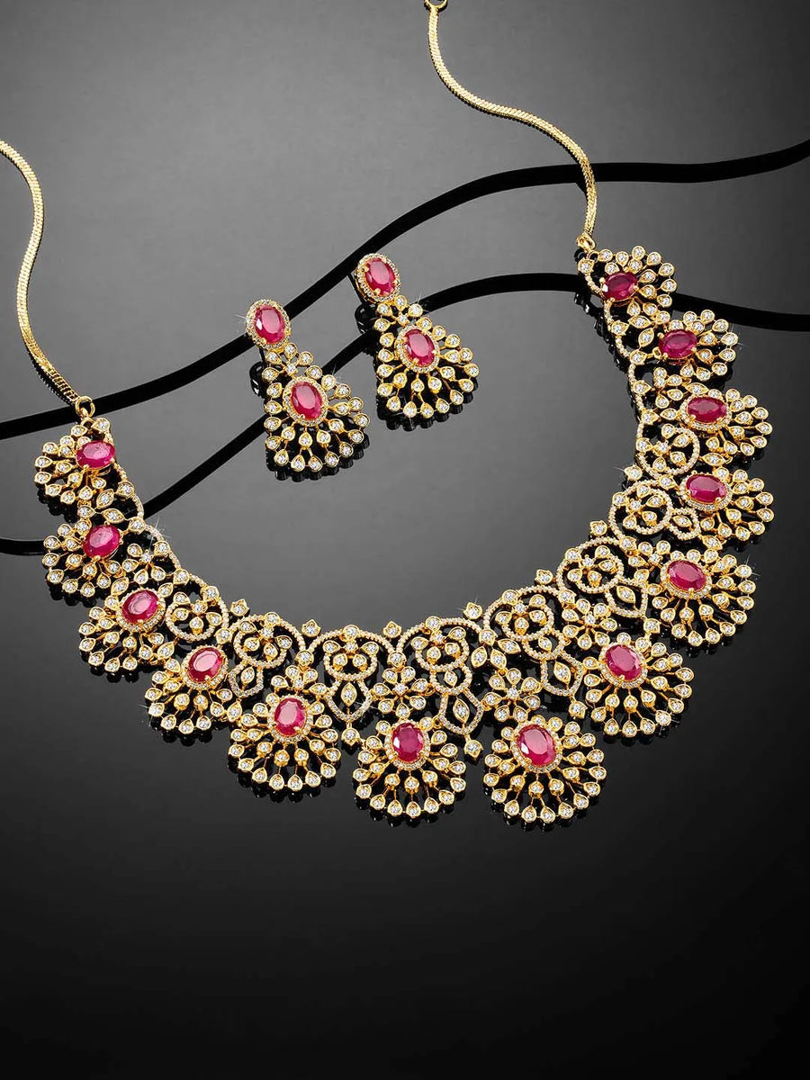 Radiant Ruby CZ and Necklace Set by Peora. Gold-plated necklace set with CZ & ruby stones with intricate designs. Best for weddings & bridal looks.