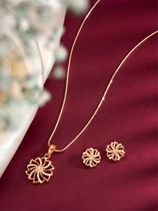 Petite Bloom CZ Floral Pendant Set
 by Peora. Rose gold-plating floral pendant necklace and matching earrings with CZ Stones.