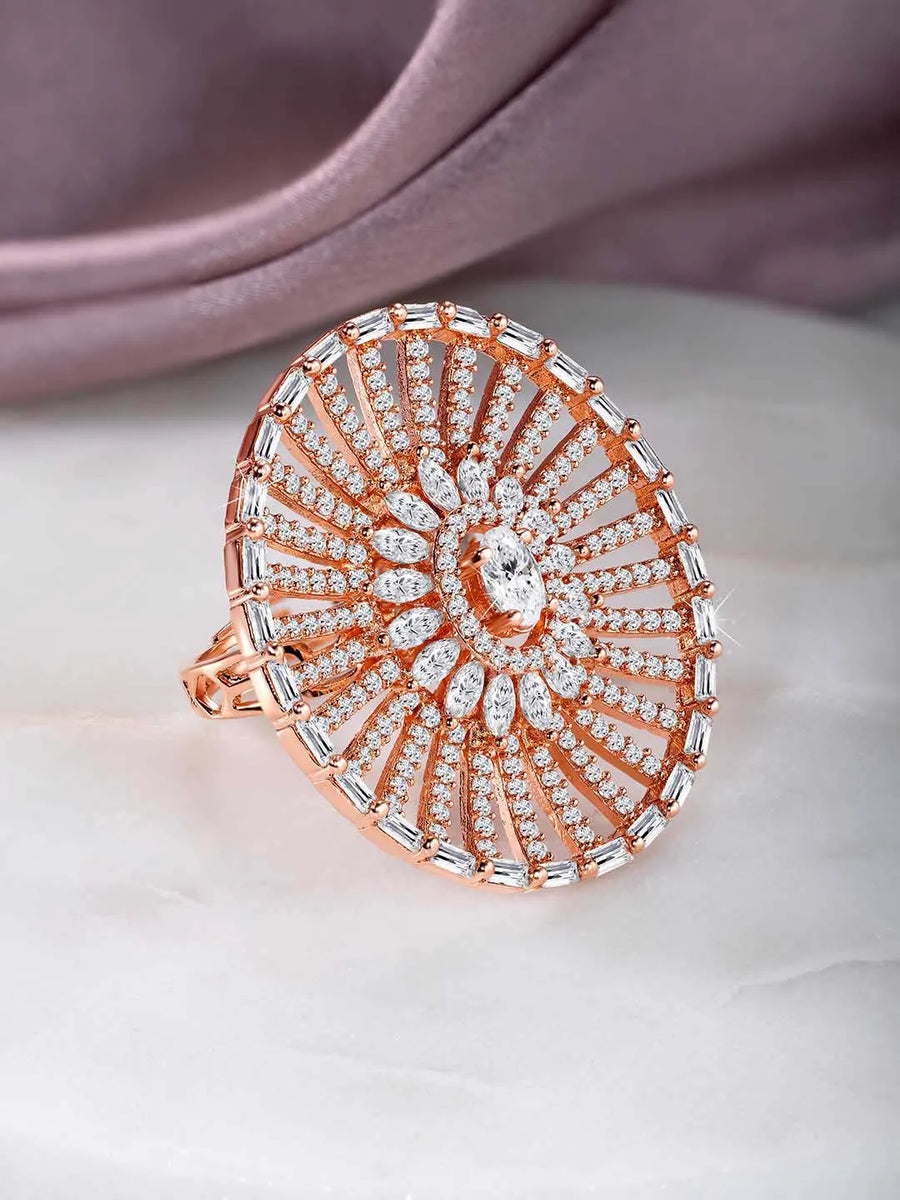 Dazzling Sparkle CZ Statement Ring. Rose gold-plated statement ring with a large central cubic zirconia and multiple surrounding smaller stones.