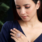 Dazzling Sparkle CZ Statement Ring. Rose gold-plated statement ring with a large central cubic zirconia and multiple surrounding smaller stones.