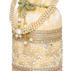Cream potli bag named Exquisite Charming Embroidery Potli, featuring faux pearl detailing and soft fabric texture | Peora
