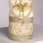 Cream potli bag named Exquisite Charming Embroidery Potli, featuring faux pearl detailing and soft fabric texture | Peora

