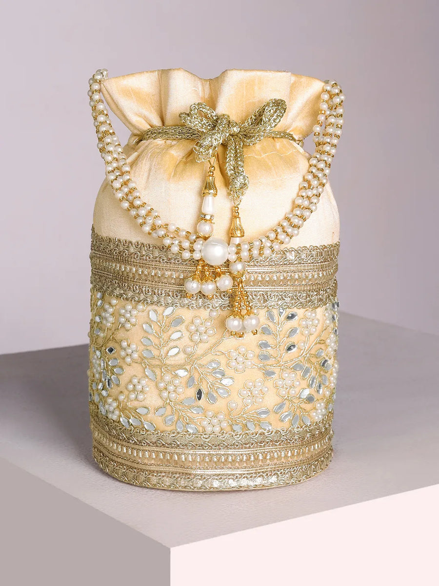 Cream potli bag named Exquisite Charming Embroidery Potli, featuring faux pearl detailing and soft fabric texture | Peora
