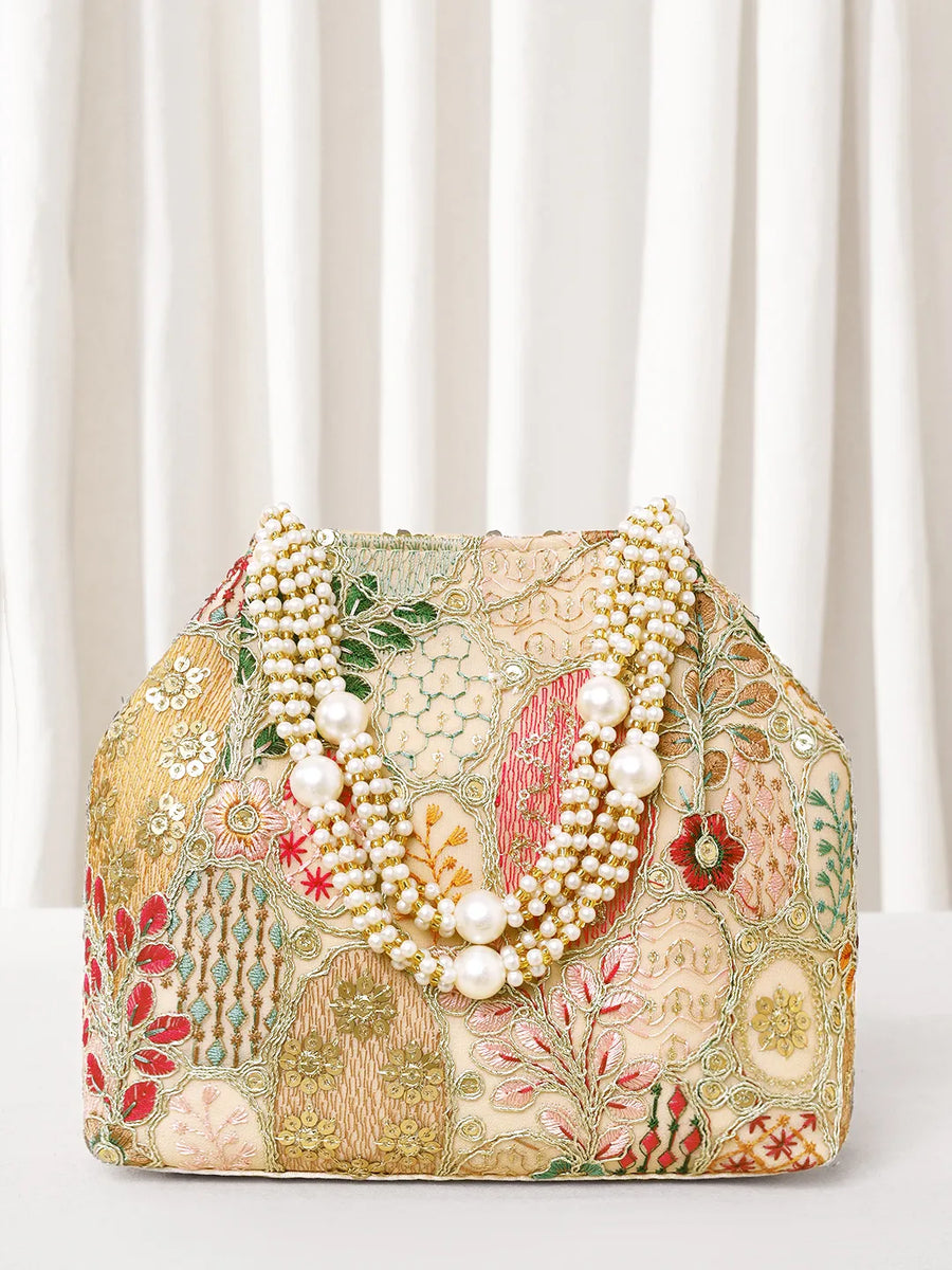 Cream potli bag named Royal Charm Handcrafted Embroidery Potli, featuring artificial beads detailing and soft fabric texture | Peora
