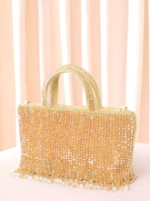 Cream clutch bag named Fringed Crystal Beaded Hand Purse, featuring artificial beads detailing and soft fabric texture | Peora
