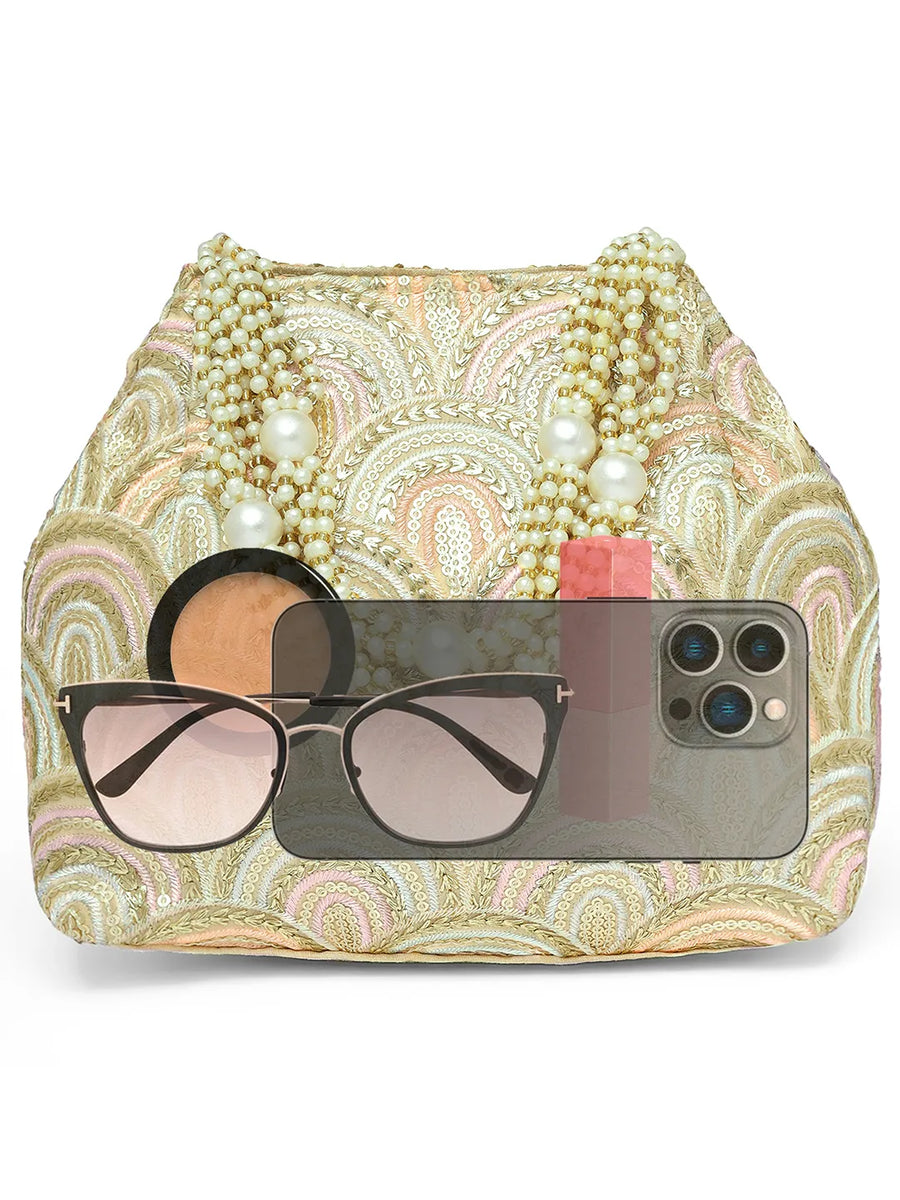 Cream potli bag named Sequin Wave Embellished Potli Bag, featuring artificial beads detailing and soft fabric texture | Peora
