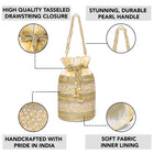 Cream potli bag named Sequin & Pearl Embellished Potli Bag, featuring faux pearl detailing and soft fabric texture | Peora
