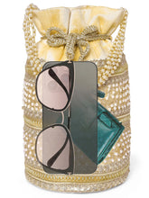 Cream potli bag named Sequin & Pearl Embellished Potli Bag, featuring faux pearl detailing and soft fabric texture | Peora
