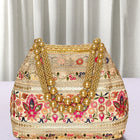Cream potli bag named Thread Embroidery Potli with Sequin Motif, featuring artificial beads detailing and soft fabric texture | Peora
