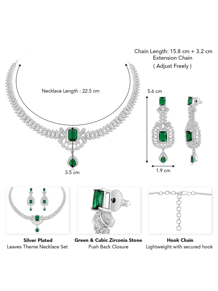 Emerald Elegance Crystal CZ Necklace Set. A silver-colored necklace and earring set with green emerald stones and clear cubic zirconia accents.