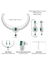 Emerald Elegance Crystal CZ Necklace Set. A silver-colored necklace and earring set with green emerald stones and clear cubic zirconia accents.