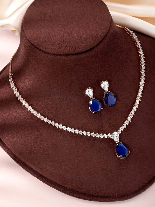Stunning CZ Crystal Necklace Set. Rose gold plating, pair of earrings, with blue & white stones.