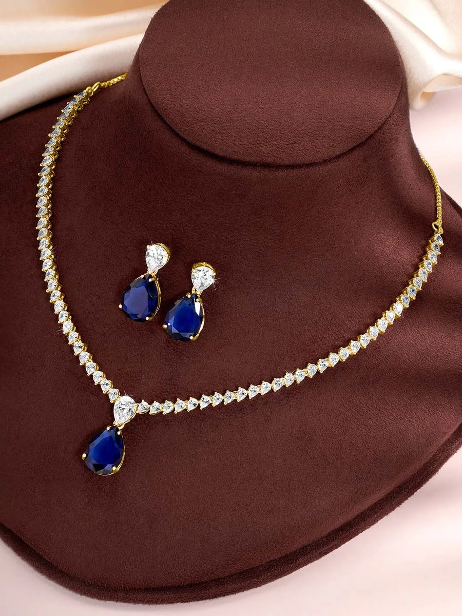 Stunning CZ Crystal Necklace Set. Gold plating, pair of earrings, with blue & white stones.