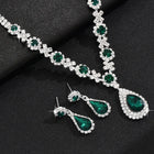 Green Stones necklace earrings set crafted from alloy, adorned with crystals & cubic zirconia for an elegant, timeless look | Peora
