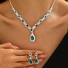Green Stones necklace earrings set crafted from alloy, adorned with crystals & cubic zirconia for an elegant, timeless look | Peora
