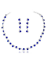 Blue necklace earrings set crafted from alloy, adorned with crystals & cubic zirconia for an elegant, timeless look | Peora

