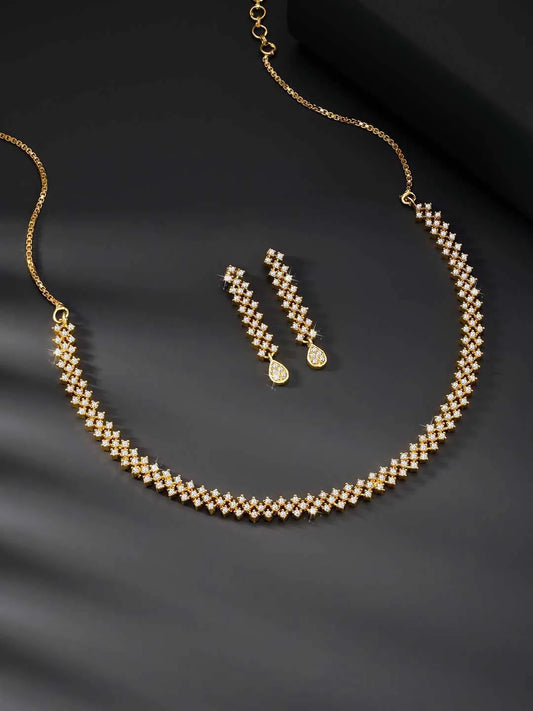 Chic Shine CZ Studded Necklace Set. A gold-plated necklace set with earrings & cubic zirconia stones. 