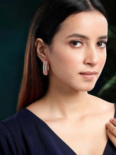 Elegance CZ Half Hoops Earrings. Rose gold-plated half hoop earrings with cubic zirconia.