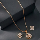 CZ Petal Perfection Pendant Set. Rose gold-plated pendant set with a floral design with earrings & CZ stones.