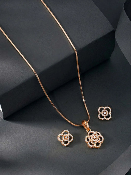CZ Petal Perfection Pendant Set. Rose gold-plated pendant set with a floral design with earrings & CZ stones.