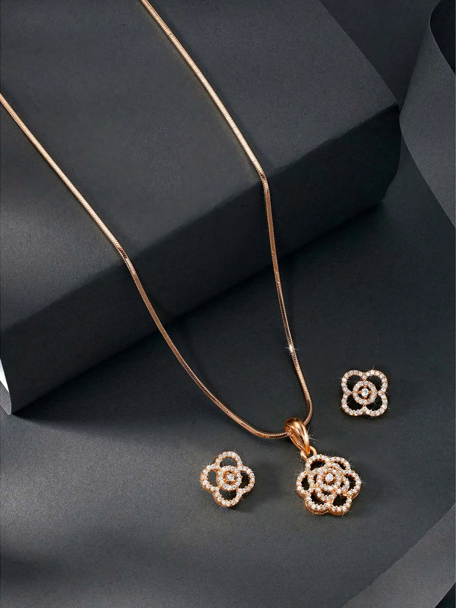 CZ Petal Perfection Pendant Set. Rose gold-plated pendant set with a floral design with earrings & CZ stones.