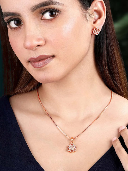 CZ Petal Perfection Pendant Set. Rose gold-plated pendant set with a floral design with earrings & CZ stones.