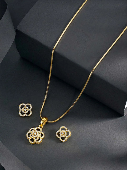 CZ Petal Perfection Pendant Set. Gold-plated pendant set with a floral design with earrings & CZ stones.